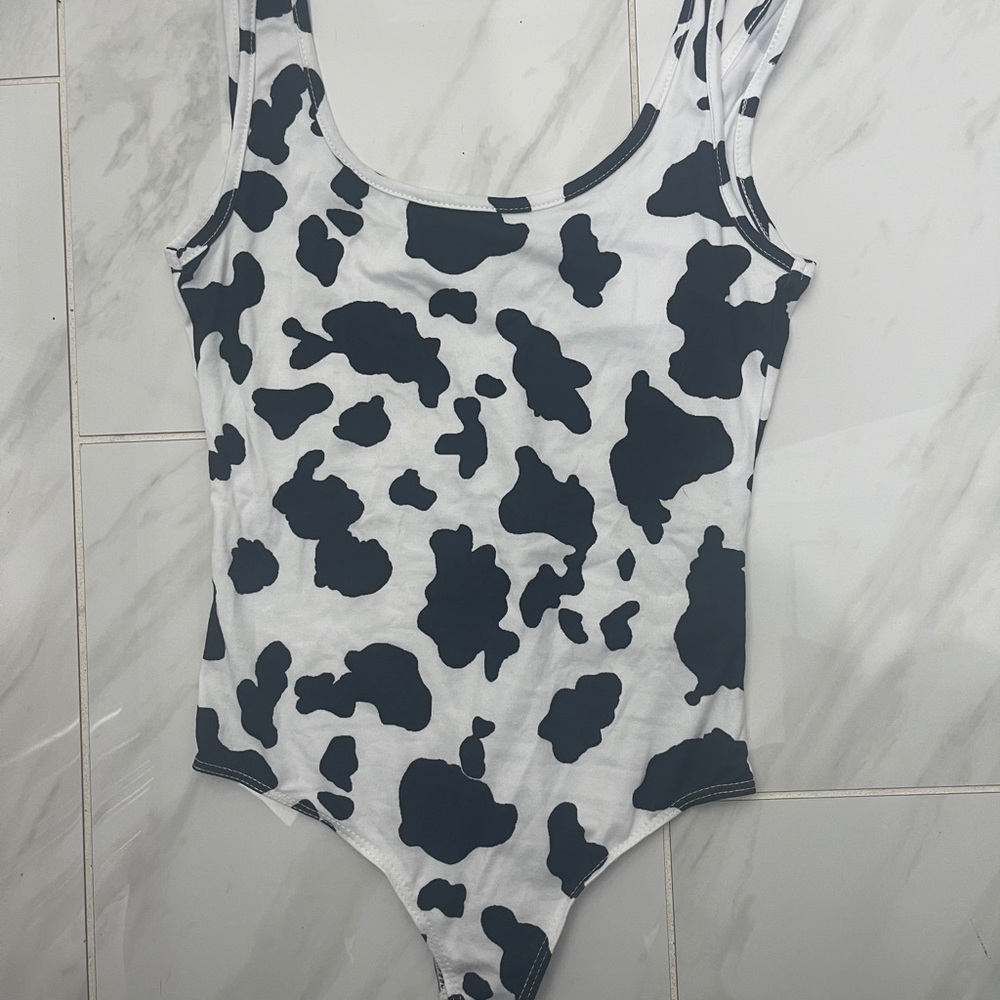 baddieville cowprint body suit